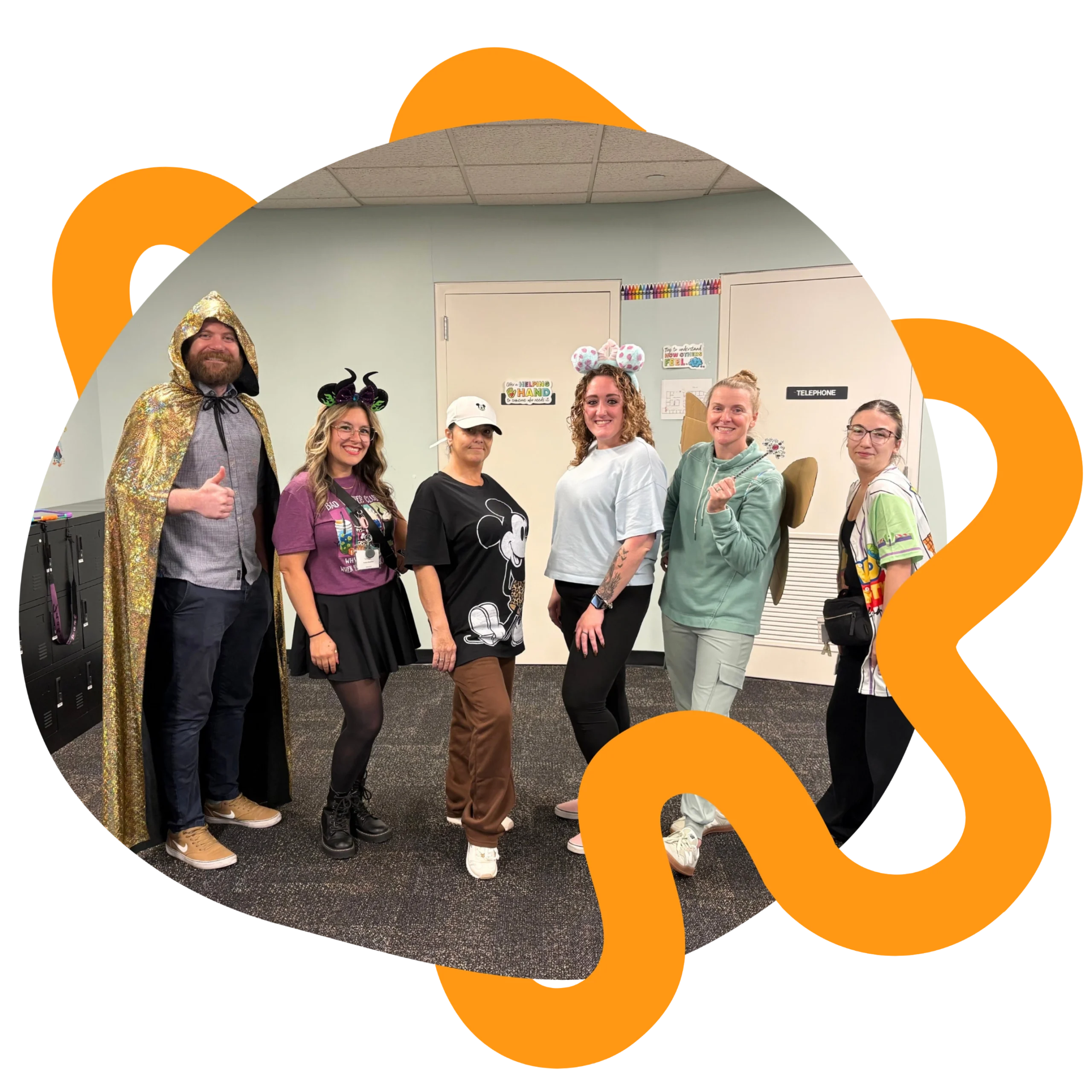 Six clinical staff at Autism Care Partners are dressed up as Disney characters.